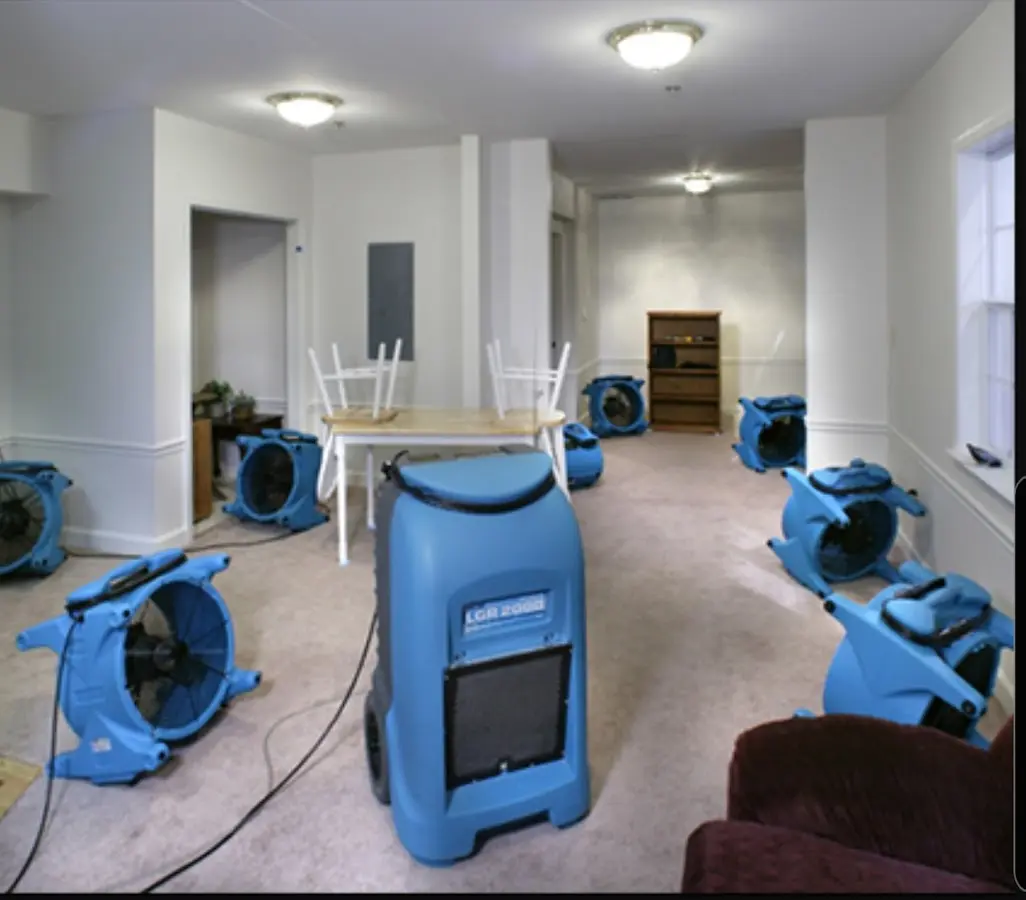 Air movers and dehumidifier setup for Water Damage Restoration in St. Charles